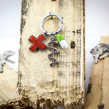 Load image into Gallery viewer, TROIKA Keyring - Keep Well with 3 Charms: Rod of Asclepius, Red Cross, Pill
